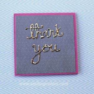 gold foiling on paper with glue