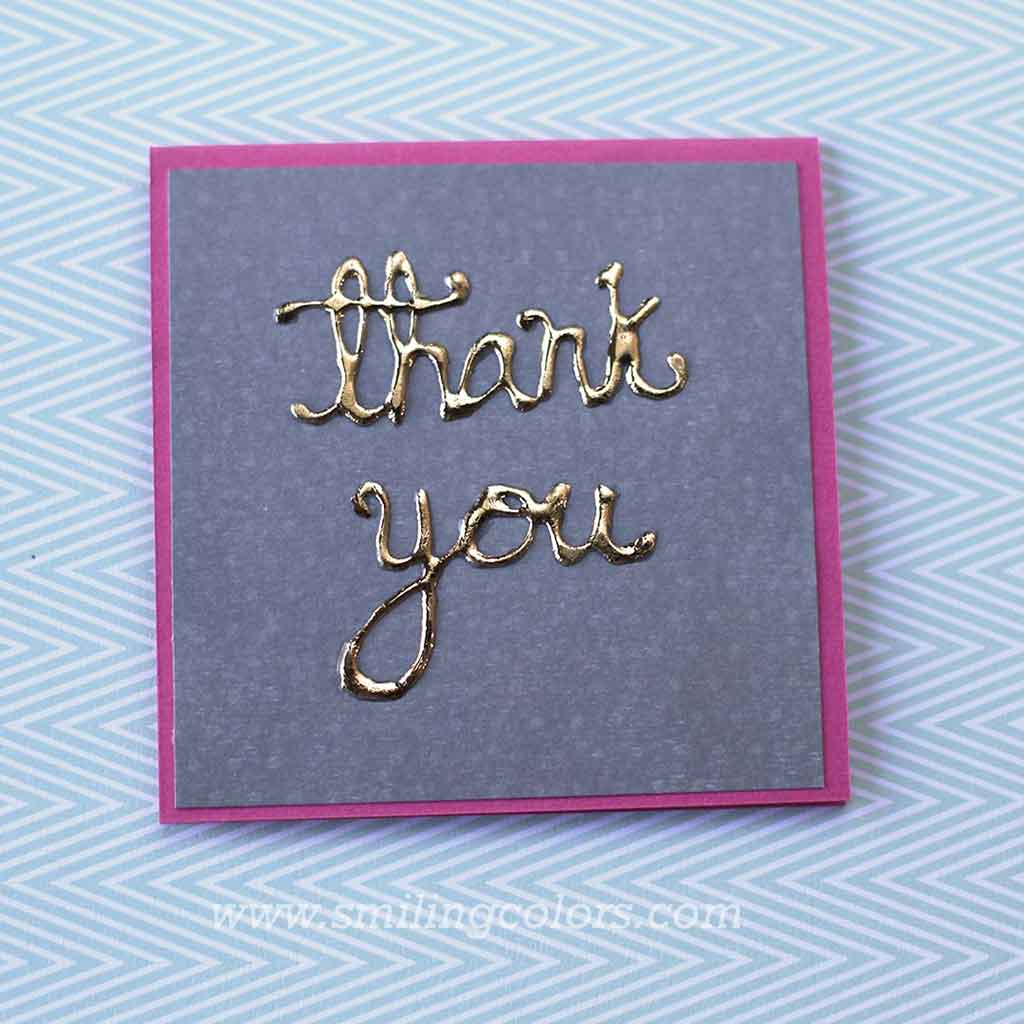gold foil on paper with glue