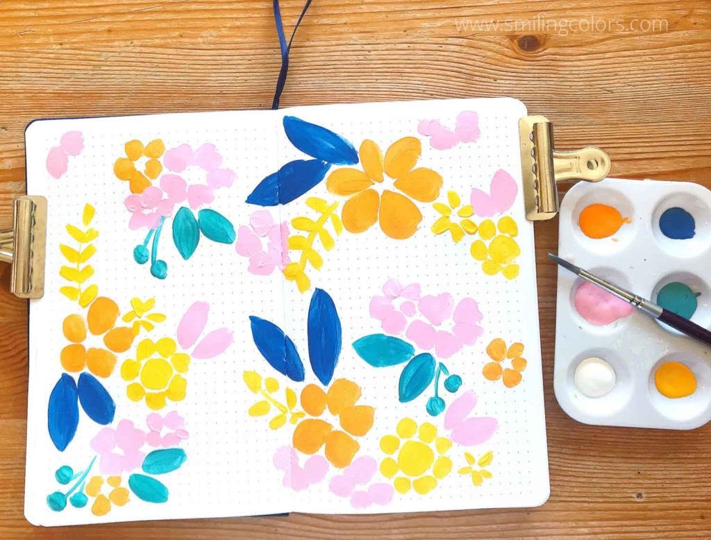 painting flowers in a sketchbook step4
