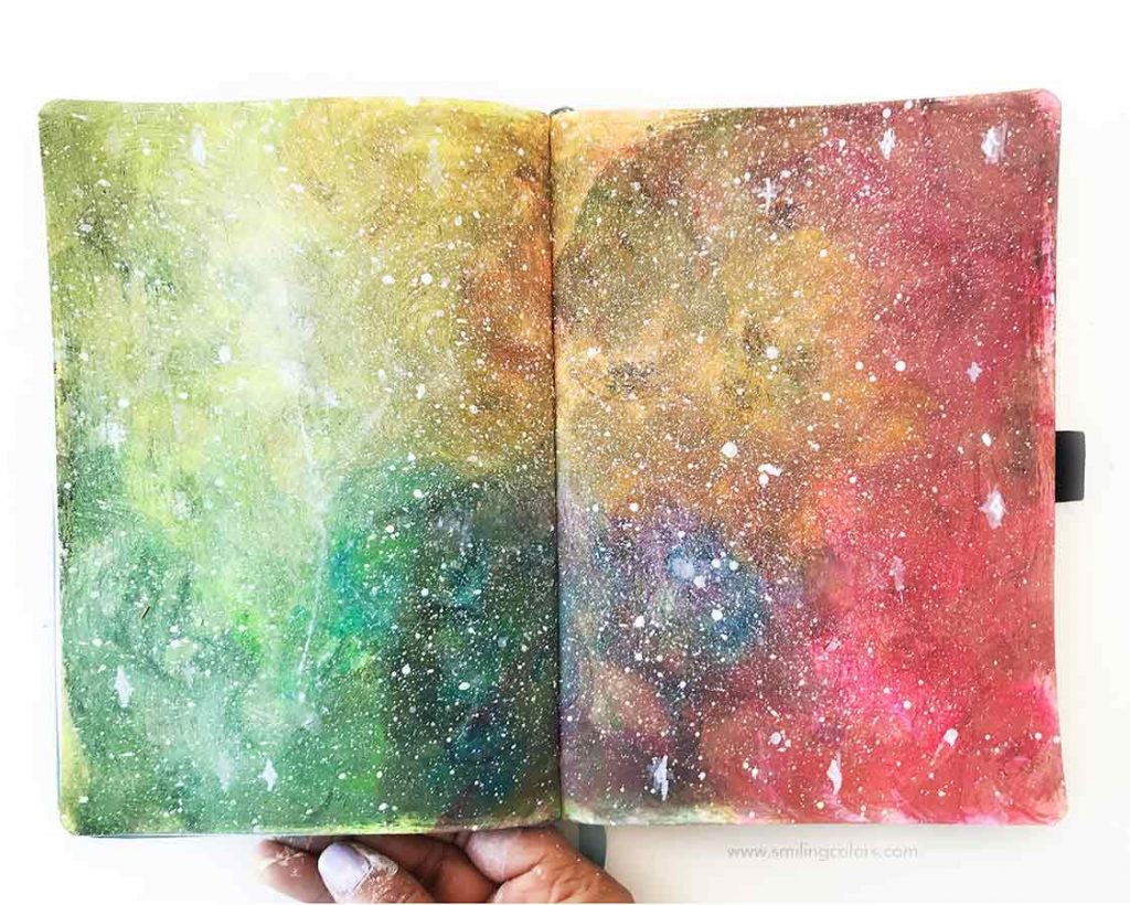 How to paint a rainbow galaxy in your sketchbook