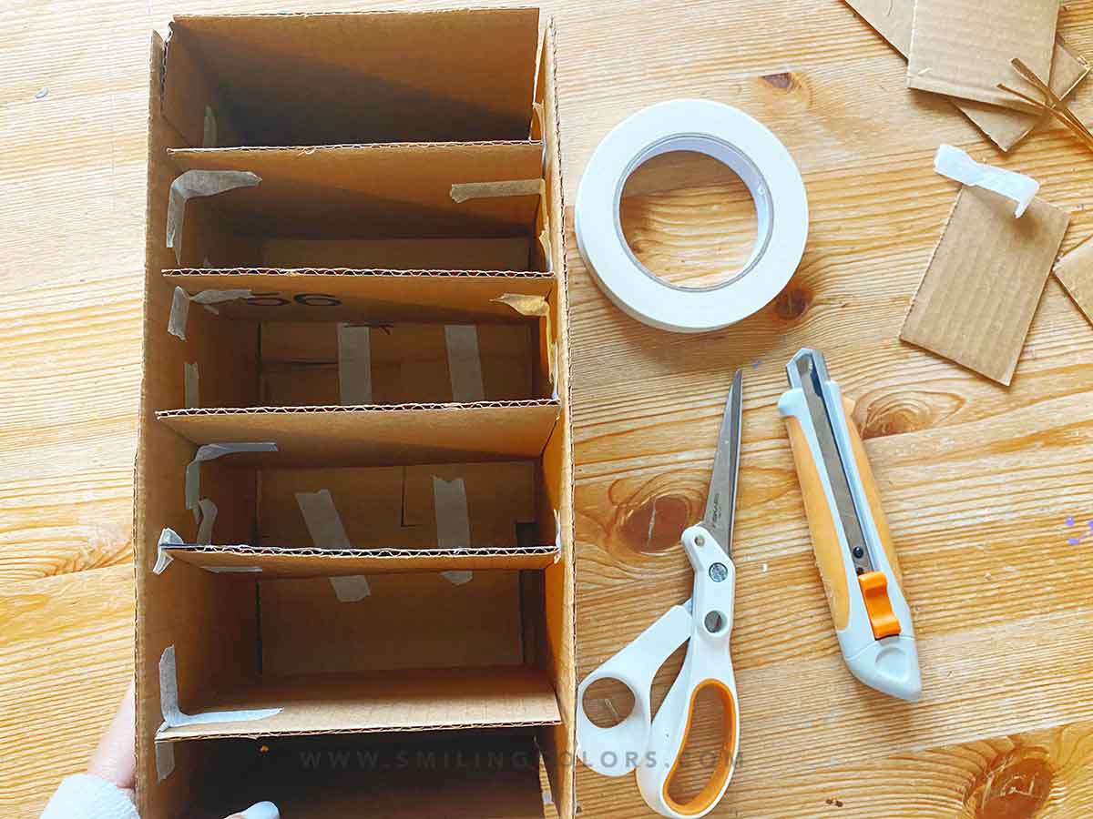 reusing cardboard boxes for organization