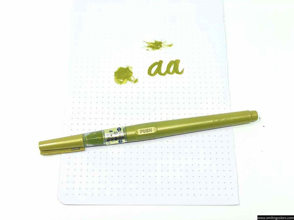 Kuretake gold pen